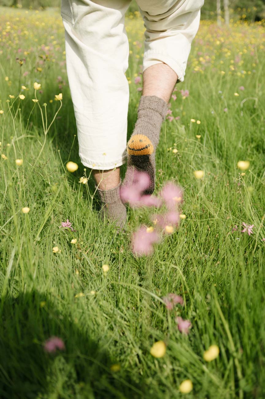 feet in grass